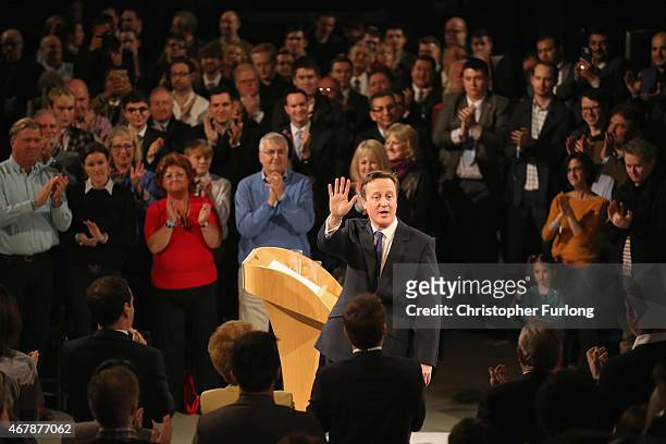 Prime Minister David Cameron is applauded by supporters after his speech at the Conservative party's Spring Forum on March 28, 2015 in Manchester,...