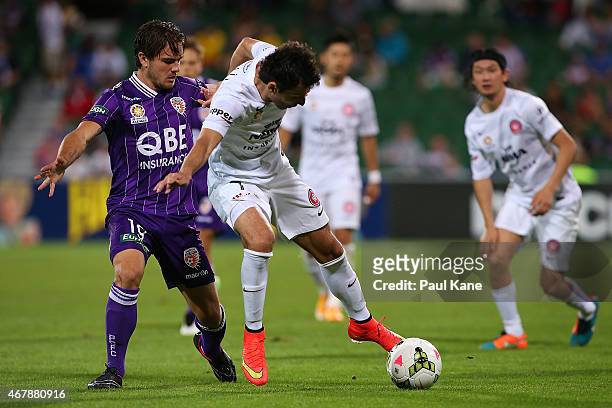 Labinot Haliti of the Wanderers controls th eball against Josh Risdon of the Glory during the round 23 A-League match between Perth Glory and the...