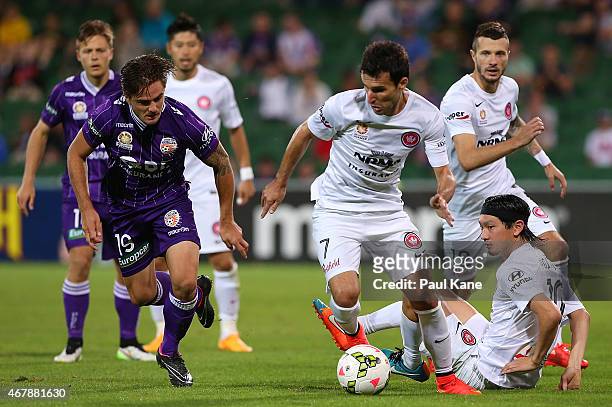 Labinot Haliti of the Wandererscontrols the ball against Josh Risdon of the Glory during the round 23 A-League match between Perth Glory and the...
