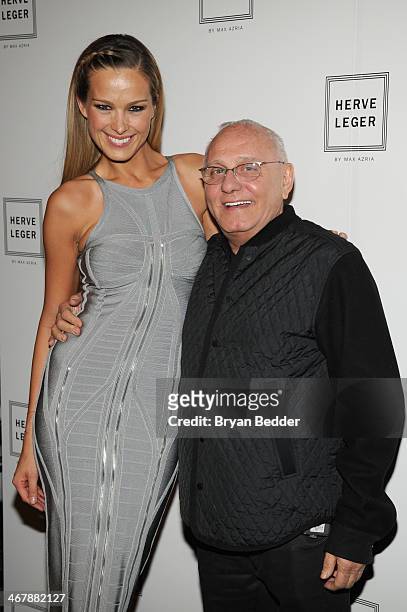 Model Petra Nemcova and designer Max Azaria pose backstage at the Herve Leger By Max Azria fashion show during Mercedes-Benz Fashion Week Fall 2014...