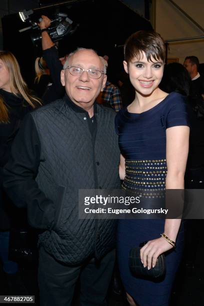 Designer Max Azaria and Sami Gayle pose backstage at the Herve Leger By Max Azria fashion show during Mercedes-Benz Fashion Week Fall 2014 at The...