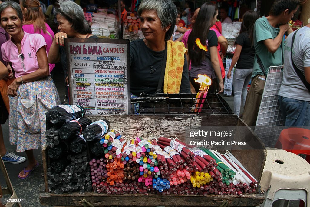 A vendor hear the Quiapo Church in Manila selling prayer...