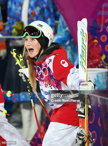 Justine Dufour-Lapointe of Canada celebrates after winning the Ladies' Moguls Final during day 1 of the Sochi 2014 Winter Olympics at Rosa Khutor...