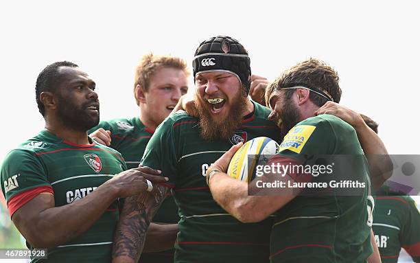 Geoff Parling of Leicester Tigers is congratulated by Sebastian de Chaves after scoring a second half try during the Aviva Premiership match between...