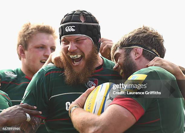 Geoff Parling of Leicester Tigers is congratulated by Sebastian de Chaves after scoring a second half try during the Aviva Premiership match between...