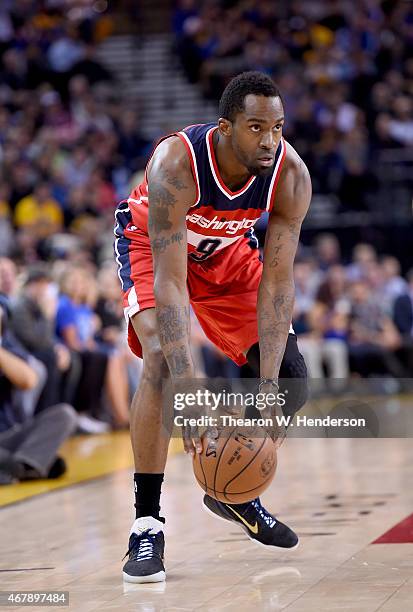 Martell Webster of the Washington Wizards looks to make a move with the ball against the Golden State Warriors at ORACLE Arena on March 23, 2015 in...