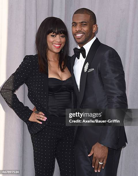 Player Chris Paul and wife Jada Crawley arrive at the Comedy Central Roast of Justin Bieber on March 14, 2015 in Los Angeles, California.