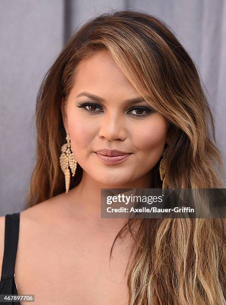 Model Chrissy Teigen arrives at the Comedy Central Roast of Justin Bieber on March 14, 2015 in Los Angeles, California.