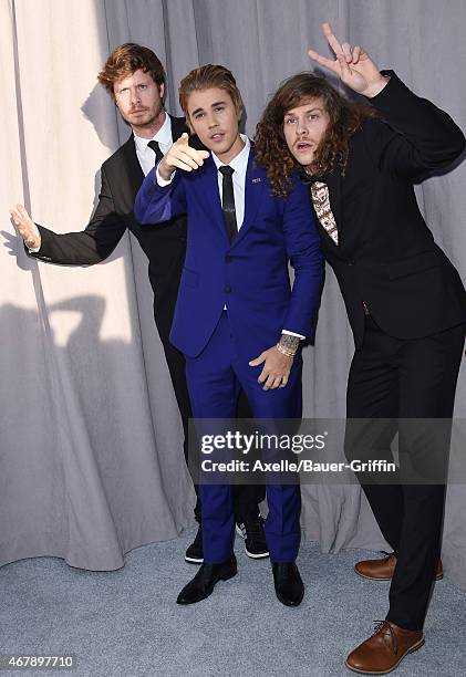 Actor Anders Holm, honoree Justin Bieber and actor Blake Anderson arrive at the Comedy Central Roast of Justin Bieber on March 14, 2015 in Los...