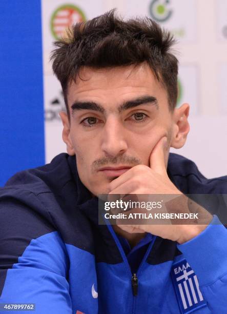 Greek midfielder Lazaros Christodoulopoulos attends a press conference in Budapest on March 28, 2015 on the eve of the Euro 2016 qualifying football...