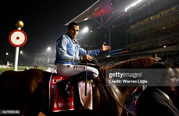 William Buick celebrates riding Prince Bishop to victory in the Dubai World Cup at the Meydan Racecourse on March 28, 2015 in Dubai, United Arab...
