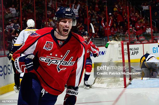 Troy Brouwer of the Washington Capitals celebrates after scoring a goal in the second period against the Nashville Predators during an NHL game at...