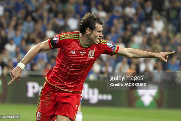 Wales' midfielder Gareth Bale celebrates his goal during the Euro 2016 qualifying football match between Israel and Wales at the Sammy Ofer Stadium...