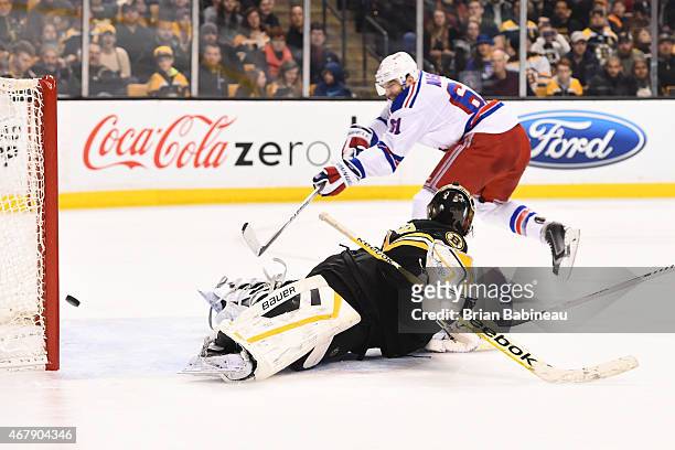 Rick Nash of the New York Rangers scores a goal against Niklas Svedberg of the Boston Bruins at the TD Garden on March 28, 2015 in Boston,...