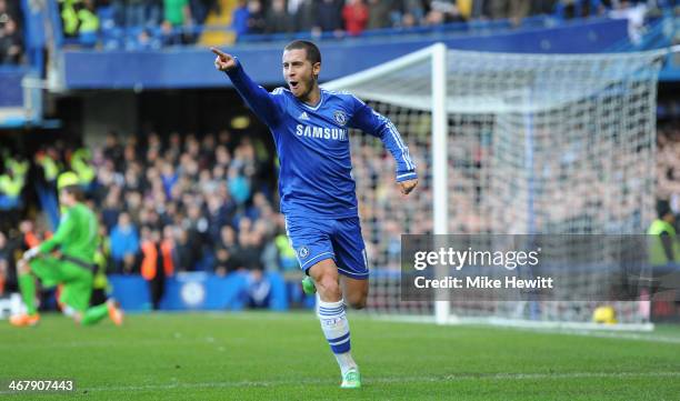 Eden Hazard of Chelsea celebrates after scoring his first goal during the Barclays Premier League match between Chelsea and Newcastle United at...