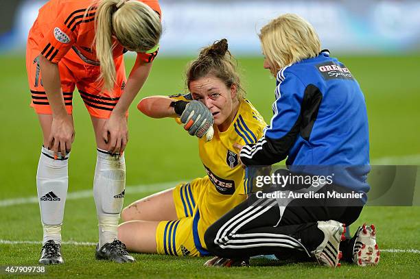 Lee Alexander of Glasgow reacts after a collision with Kosovare Asilani of Paris Saint-Germain during the UEFA Woman's Champions League Quarter Final...