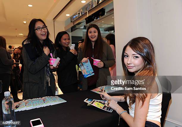 Actress Cristine Prosperi signs PROM Canada magazine at Forever 21 at the Eaton Centre Shopping Centre on February 8, 2014 in Toronto, Canada.