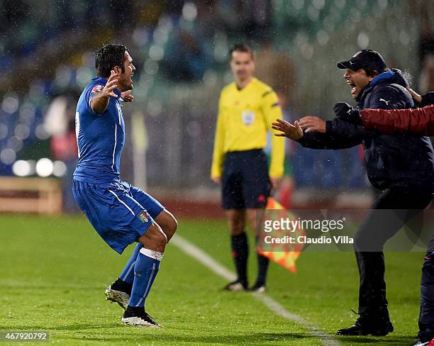 Eder of Italy and Antonio Conte celebrate after scoring the second goal during the Euro 2016 Qualifier match between Bulgaria and Italy at Vasil...