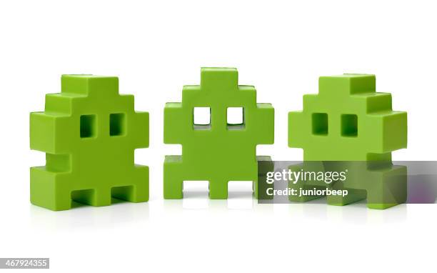 space invader toy - arcade stock pictures, royalty-free photos & images