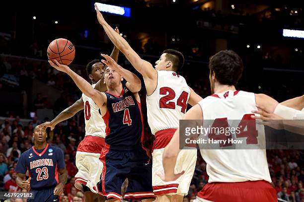 McConnell of the Arizona Wildcats goes up for a shot against Josh Gasser of the Wisconsin Badgers in the first half during the West Regional Final of...