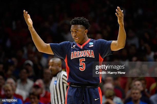 Stanley Johnson of the Arizona Wildcats reacts in the first half while taking on the Wisconsin Badgers during the West Regional Final of the 2015...