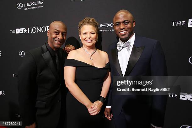 President of Music, Programming, and Specials of BET Networks Stephen G. Hill, chairman and CEO of BET Debra L. Lee, and actor Wayne Brady attend the...