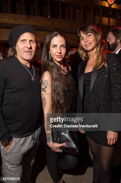 Renzo Rosso, Benedetta Mazzini and Arianna Alessi attend the private dinner Host Dean and Dan Caten of Dsquared2 at Dracula's Club in St. Moritz on...