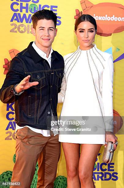 Host Nick Jonas and Olivia Culpo attend Nickelodeon's 28th Annual Kids' Choice Awards held at The Forum on March 28, 2015 in Inglewood, California.