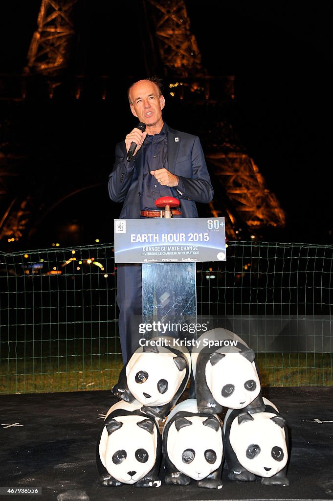 Eiffel Tower Celebrates Earth Hour In Paris