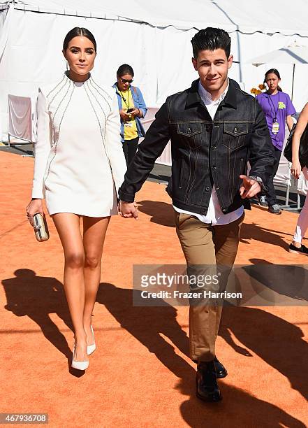 Actress Olivia Culpo and recording artist Nick Jonas attend Nickelodeon's 28th Annual Kids' Choice Awards held at The Forum on March 28, 2015 in...