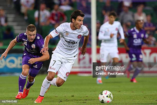 Labinot Haliti of the Wanderers controls the ball against Scott Jamieson of the Glory during the round 23 A-League match between Perth Glory and the...