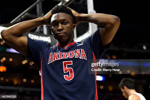 Stanley Johnson of the Arizona Wildcats reacts after called for a foul in the second half against the Wisconsin Badgers during the West Regional...