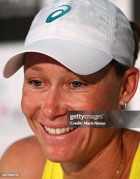 Samantha Stosur of Australia talks to the media after winning her singles match against Victoria Kan of Russia during the Fed Cup tie between...