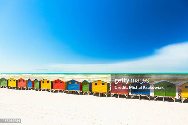 colorful beach houses in muizenberg, cape town, south africa. - cape town stockfoto's en -beelden