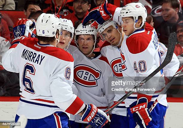 Douglas Murray, Brendan Gallagher, Rene Bourque and Nathan Beaulieu of the Montreal Canadiens celebrate a third-period goal scored by David...