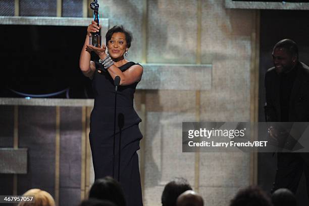 Visual artist Carrie Mae Weems speaks onstage at BET Honors 2014 at Warner Theatre on February 8, 2014 in Washington, DC.