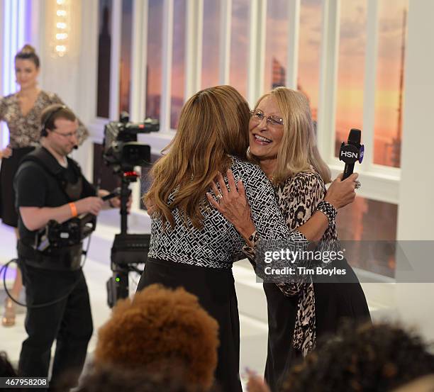 Media Icon Wendy Williams hugs audience member and Ocala, Florida resident Sherry Eggers during the launch of her apparel collection at the HSN...
