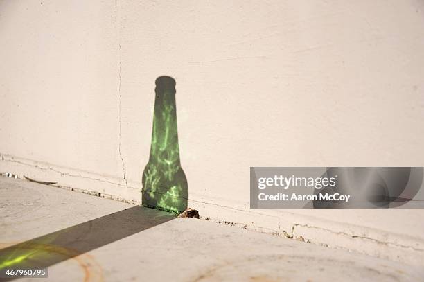 beer bottle - alcoholism stock pictures, royalty-free photos & images