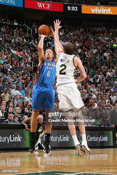 Steve Novak of the Oklahoma City Thunder shoots against Joe Ingles of the Utah Jazz on March 28, 2015 at EnergySolutions Arena in Salt Lake City,...