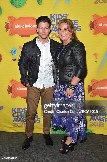 Host Nick Jonas and President of Nickelodeon and Viacom Media Networks Kids & Family Group Cyma Zarghami attend Nickelodeon's 28th Annual Kids'...