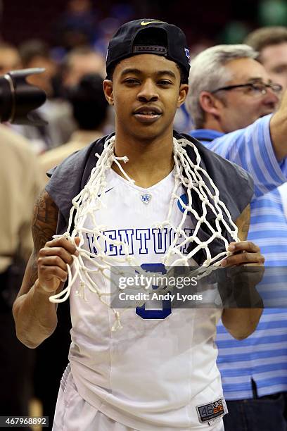 Tyler Ulis of the Kentucky Wildcats celebrates after defeating the Notre Dame Fighting Irish during the Midwest Regional Final of the 2015 NCAA Men's...