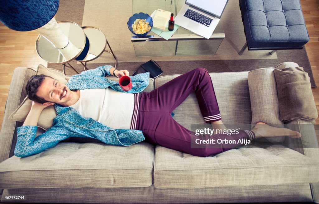 Man laying on couch