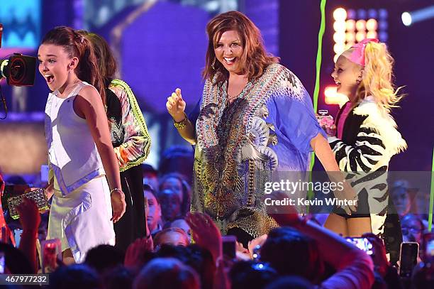 Personality/dancers Kendall Vertes, Abby Lee Miller and and Jojo Siwa walk onstage to accept the Favorite Reality Award for "Dance Moms" onstage...