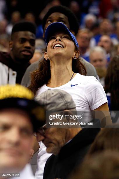 Actress Ashley Judd celebrates after the Kentucky Wildcats defeated the Notre Dame Fighting Irish during the Midwest Regional Final of the 2015 NCAA...