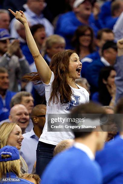 Actress Ashley Judd celebrates as the Kentucky Wildcats play the Notre Dame Fighting Irish during the Midwest Regional Final of the 2015 NCAA Men's...