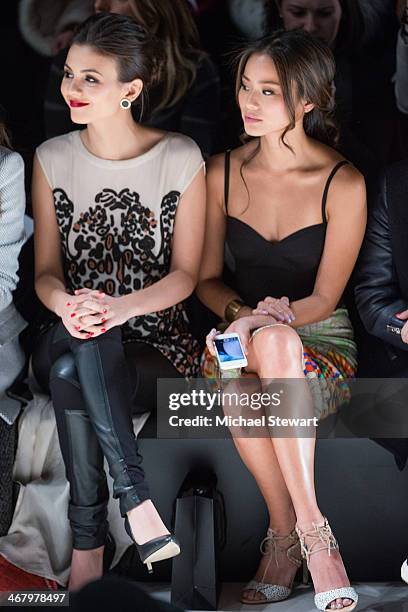 Actresses Victoria Justice and Jamie Chung attend the Mara Hoffman show during Mercedes-Benz Fashion Week Fall 2014 at The Salon at Lincoln Center on...