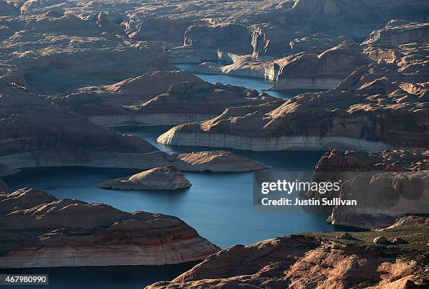 Bleached "bathtub ring" is visible on the rocky banks of Lake Powell on March 28, 2015 in Lake Powell, Utah. As severe drought grips parts of the...