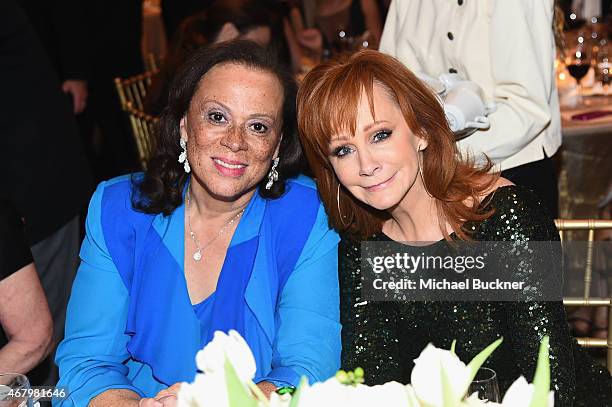 Lonnie Ali and singer Reba McEntire attend Muhammad Ali's Celebrity Fight Night XXI at the JW Marriott Phoenix Desert Ridge Resort & Spa on March 28,...