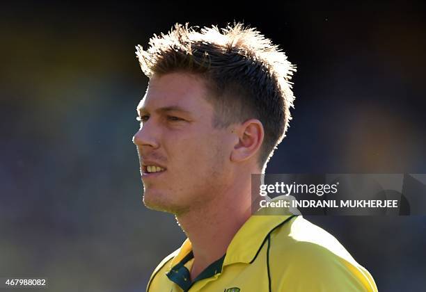 Australian cricketer James Faulkner walks back to his run-up during the 2015 Cricket World Cup final between Australia and New Zealand in Melbourne...