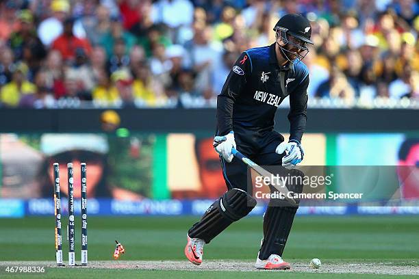 Daniel Vettori of New Zealand is dismissed by Mitchell Johnson of Australia during the 2015 ICC Cricket World Cup final match between Australia and...